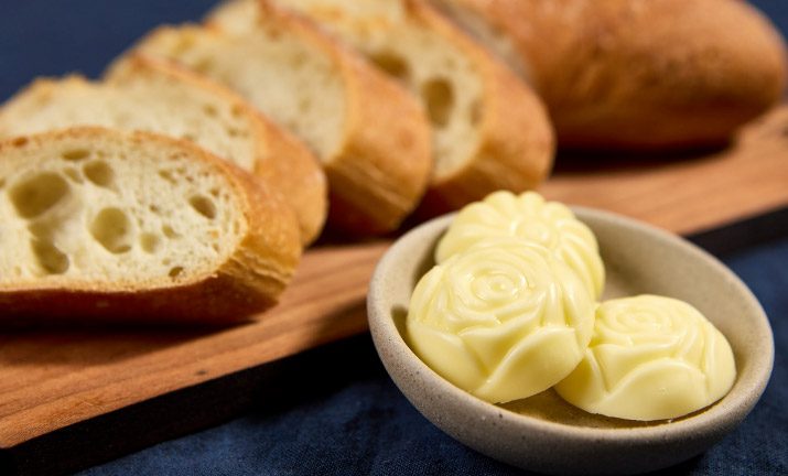 Pre-positioning bread & butter at tables for a quick bite can take the pressure of your wait staff as guests await their plated meal.